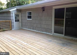 202 Tamarack Road Chestertown, MD 21620 - Photo 6 of 32 REAR DECK OFFERS PRIVACY
