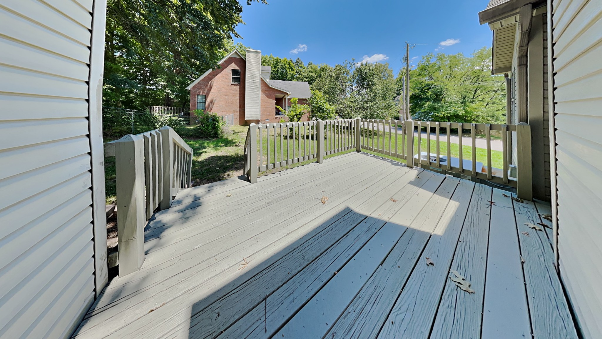 728 Bishopsgate Road Antioch, TN 37013 - Photo 12 of 15 a view of balcony with wooden floor and fence
