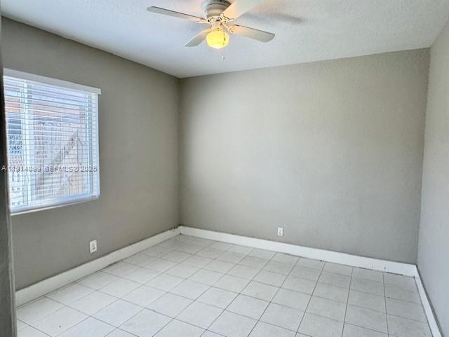 260 Southwest 8th Avenue, Unit B Hallandale Beach, FL 33009 - Photo 13 of 23 wooden floor in an empty room with a window