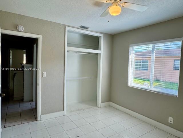 260 Southwest 8th Avenue, Unit B Hallandale Beach, FL 33009 - Photo 14 of 23 a view of an empty room with cabinet and window