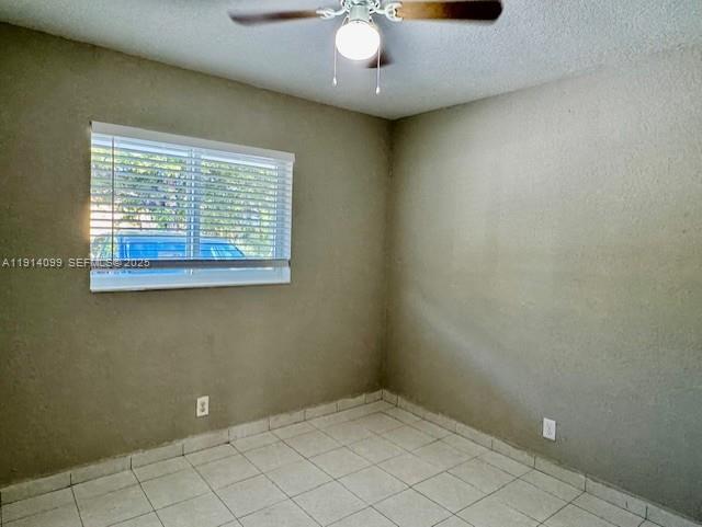 260 Southwest 8th Avenue, Unit B Hallandale Beach, FL 33009 - Photo 16 of 23 an empty room with a window