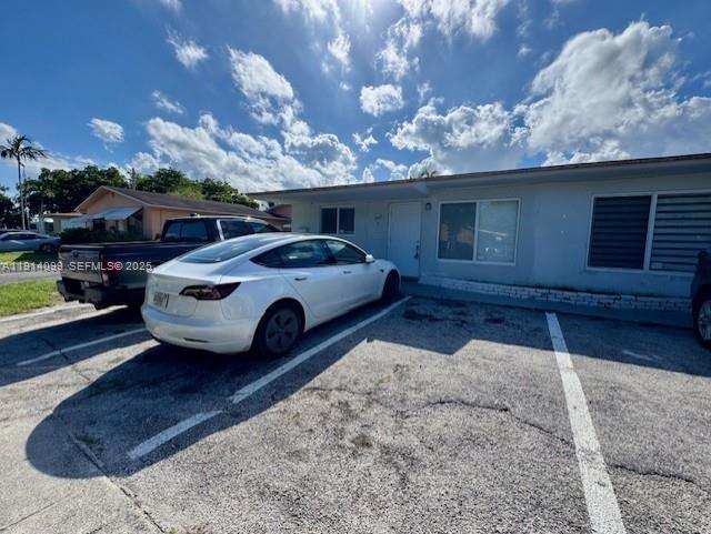 260 Southwest 8th Avenue, Unit B Hallandale Beach, FL 33009 - Photo 23 of 23 a view of a car parked in front of a house