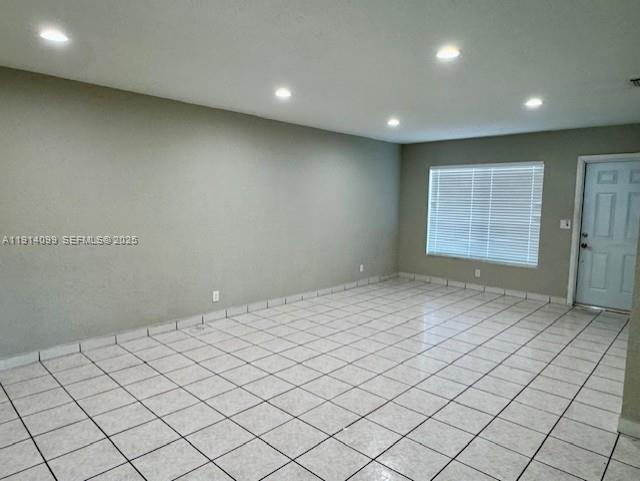 260 Southwest 8th Avenue, Unit B Hallandale Beach, FL 33009 - Photo 6 of 23 a view of an empty room and window