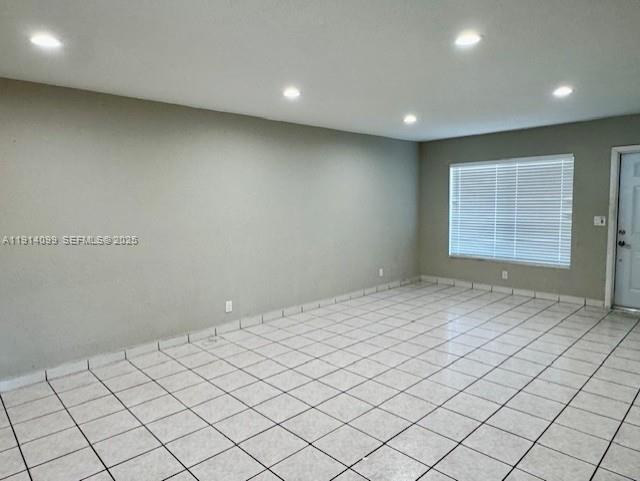 260 Southwest 8th Avenue, Unit B Hallandale Beach, FL 33009 - Photo 7 of 23 a view of an empty room and window