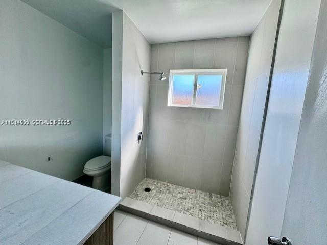 260 Southwest 8th Avenue, Unit B Hallandale Beach, FL 33009 - Photo 9 of 23 a bathroom with a sink and a toilet