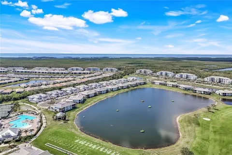 a view of a city with an ocean