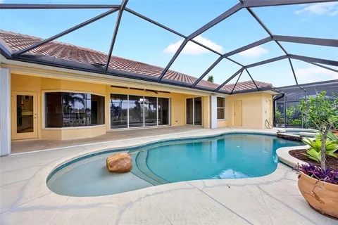 a view of a house with backyard porch and patio
