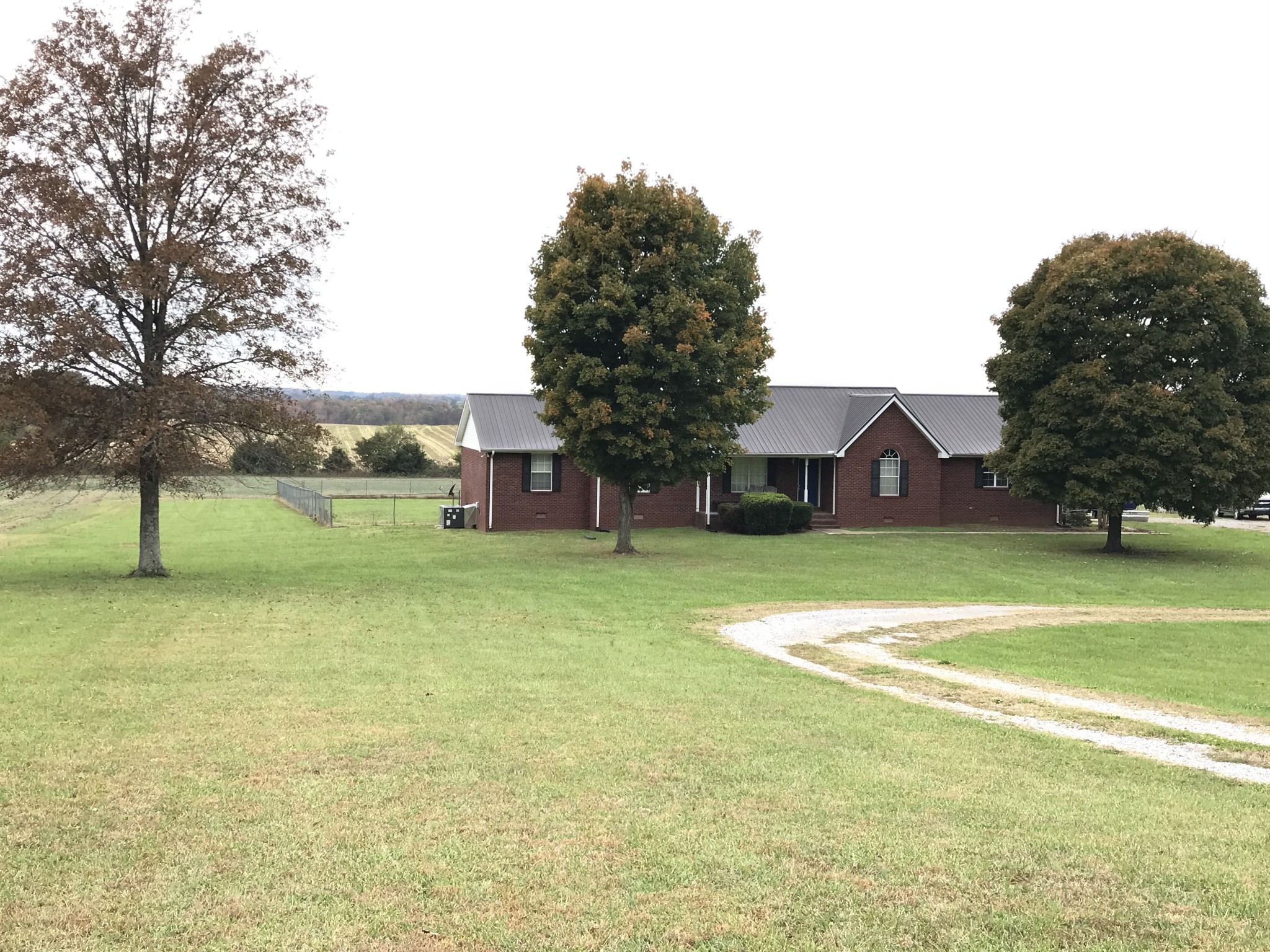 2968 Mt Zion Road Morrison, TN 37357 - Photo 1 of 4 a view of a house with a swimming pool