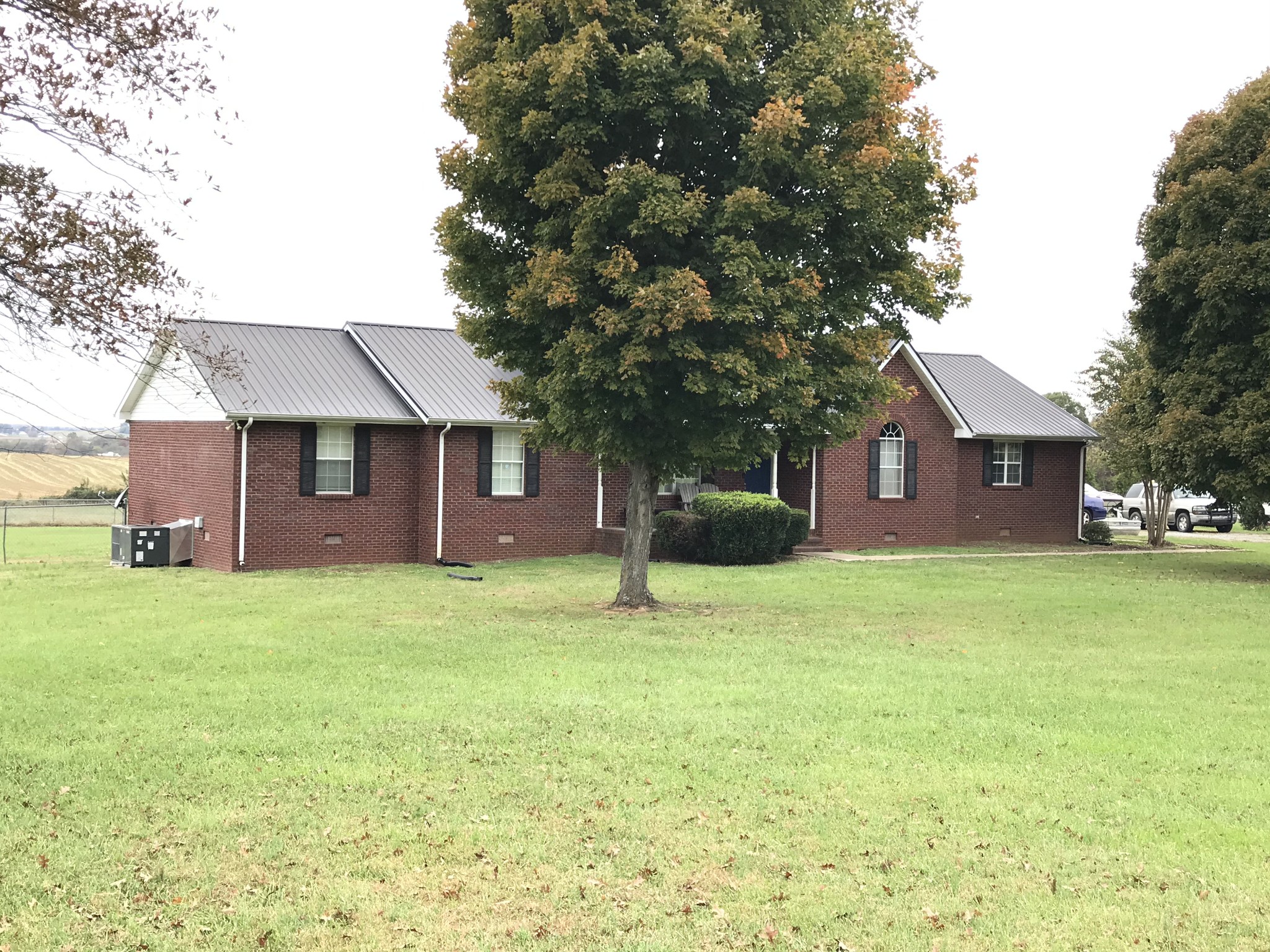 2968 Mt Zion Road Morrison, TN 37357 - Photo 3 of 4 a house is sitting in middle od the grass