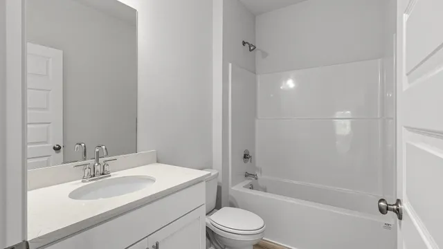 an empty room with closet area