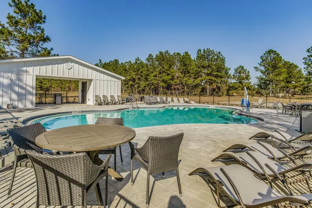 a view of a swimming pool and outdoor space