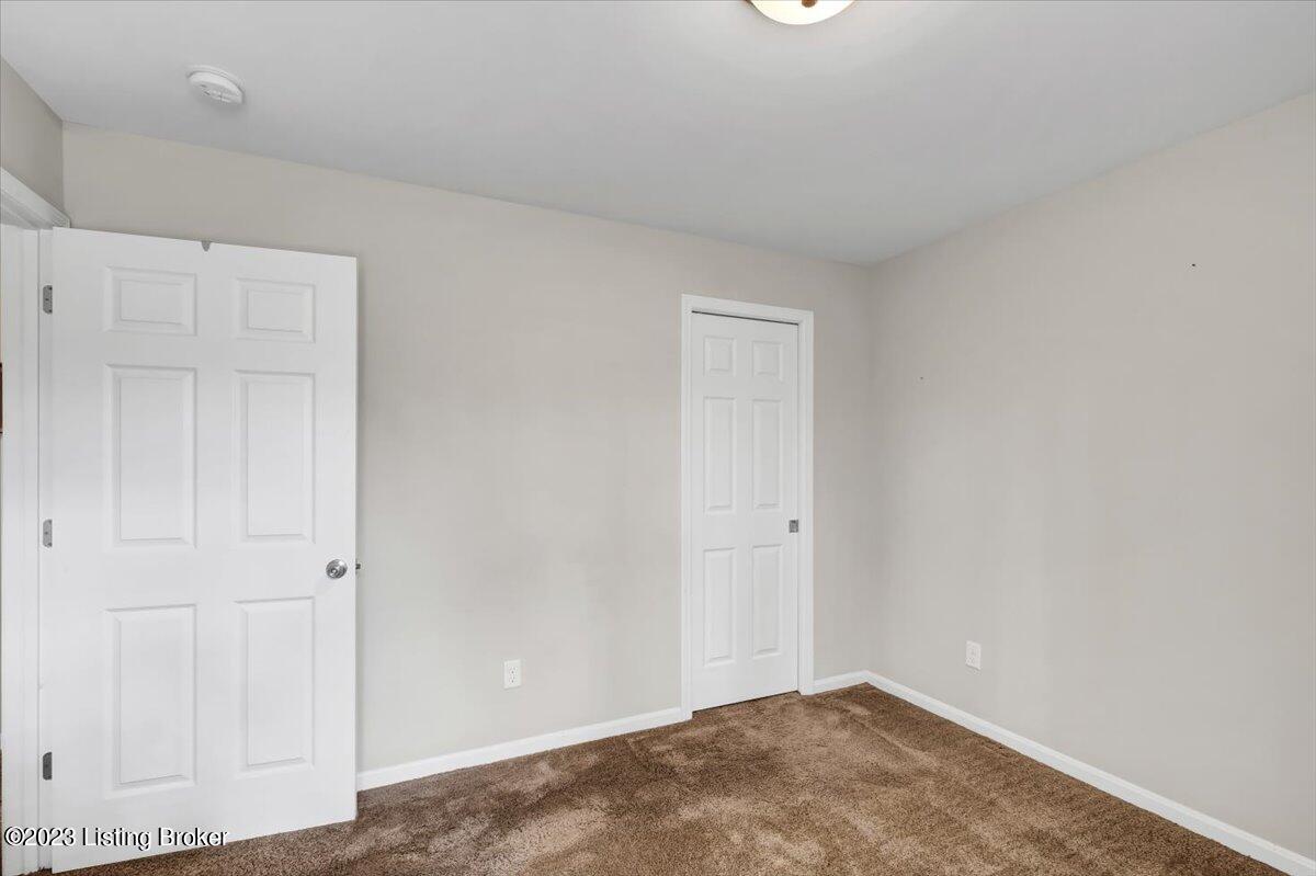 6458 Renate Road Louisville, KY 40291 - Photo 21 of 32 Walk in closet just behind the pocket door