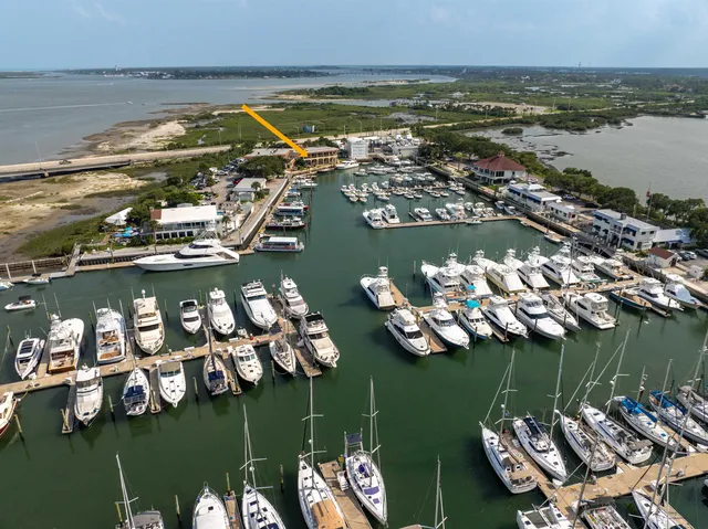 aerial view of a house with a lake view