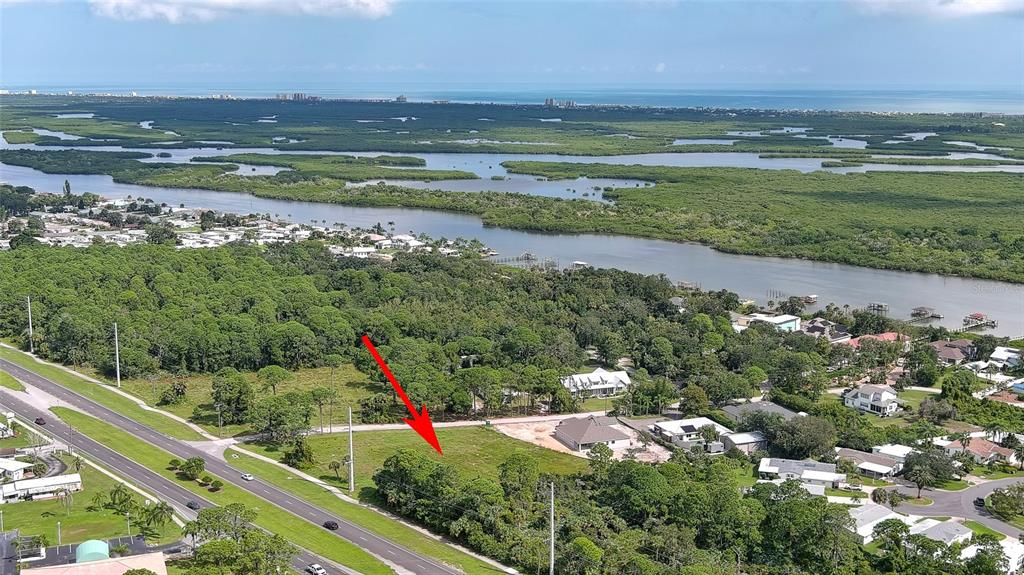 2503 South Ridgewood Avenue Edgewater, FL 32141 - Photo 4 of 6 a view of a city with an ocean view