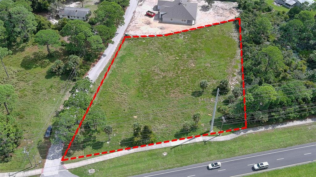 2503 South Ridgewood Avenue Edgewater, FL 32141 - Photo 6 of 6 an aerial view of green landscape