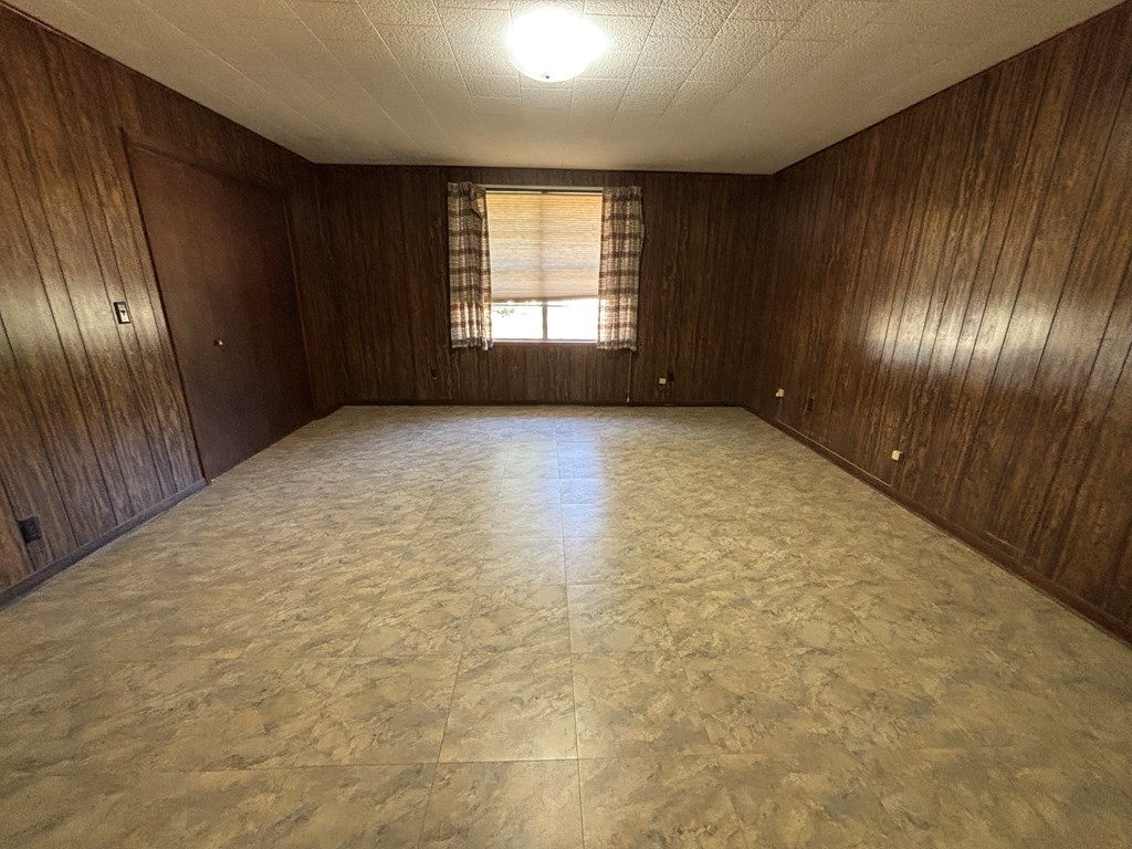 306 South Broadway Street Rocksprings, TX 78880 - Photo 13 of 23 a view of an empty room and windows