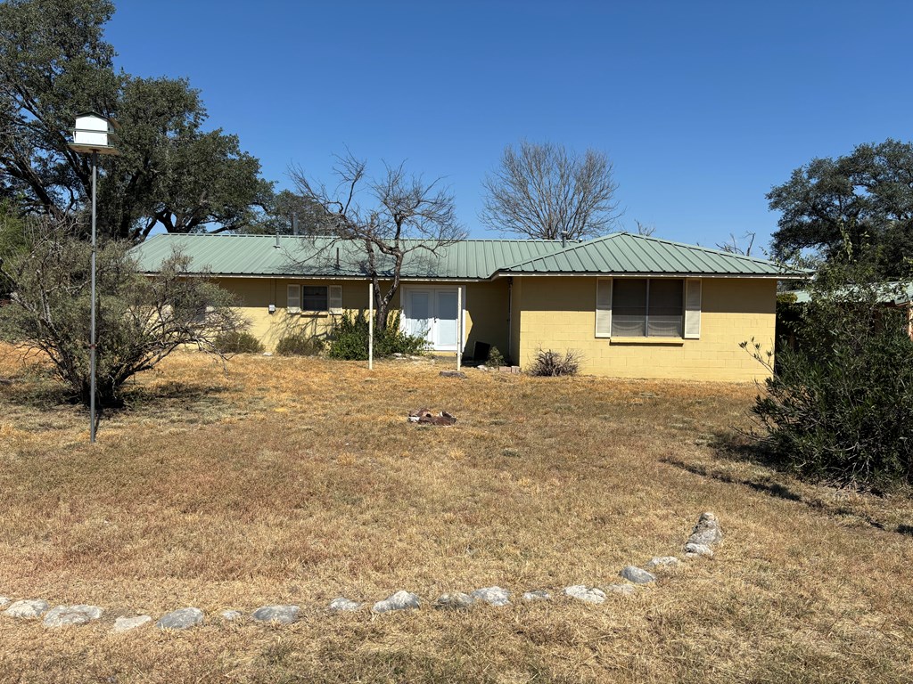 306 South Broadway Street Rocksprings, TX 78880 - Photo 3 of 23 a view of a house with a yard