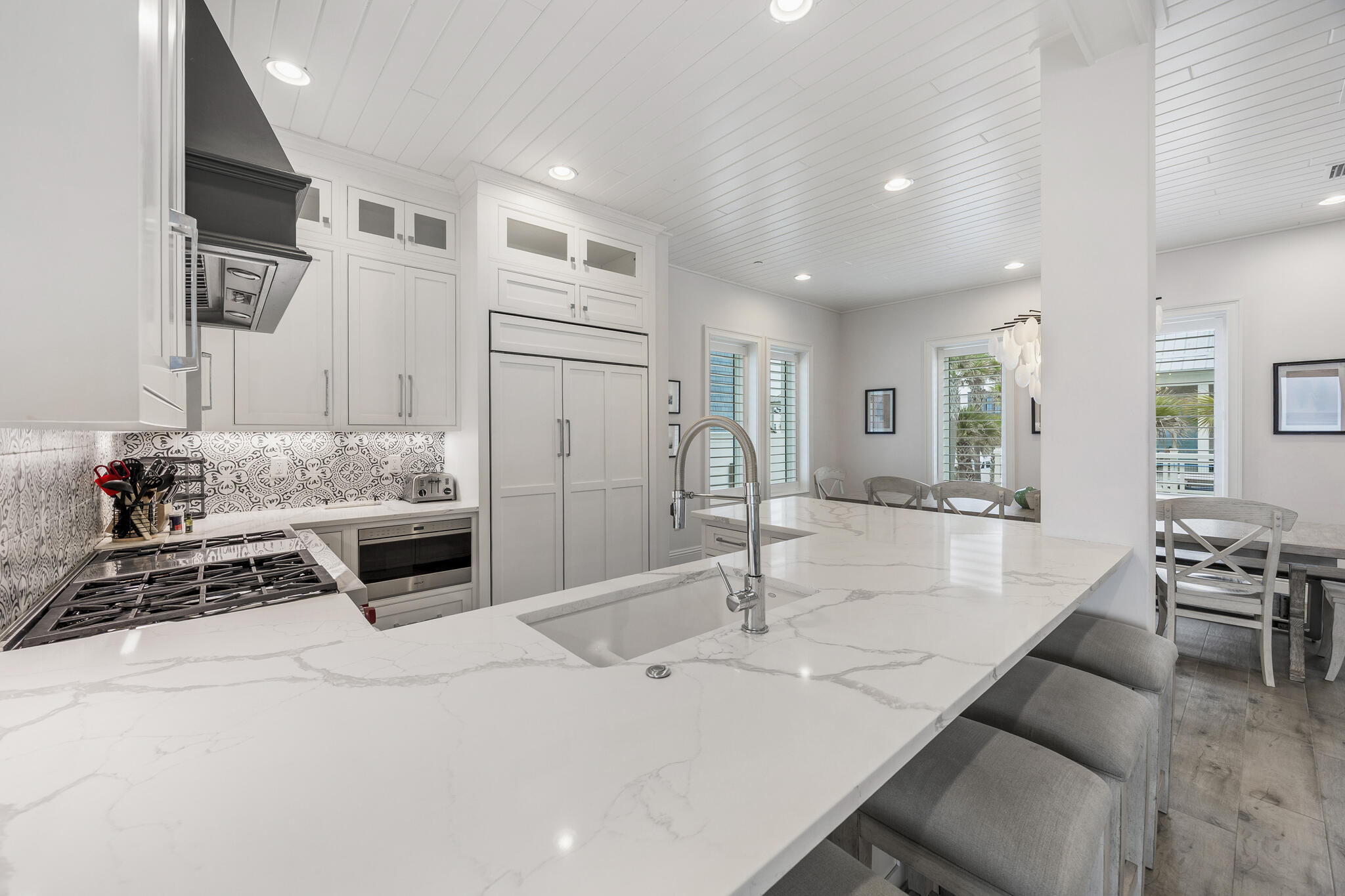 26 Azzurro Way, Unit A Santa Rosa Beach, FL 32459 - Photo 13 of 60 a kitchen with stainless steel appliances kitchen island granite countertop a sink and cabinets