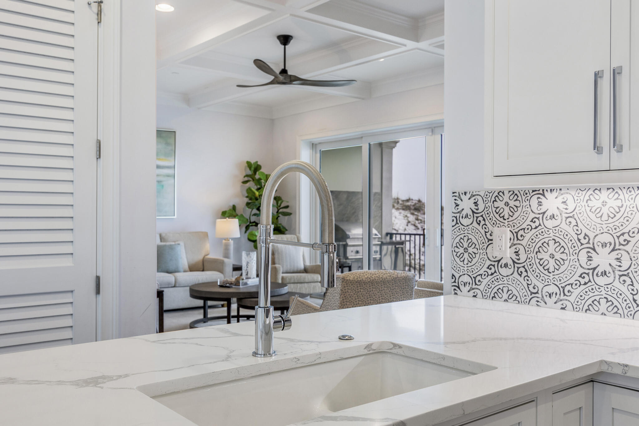26 Azzurro Way, Unit A Santa Rosa Beach, FL 32459 - Photo 16 of 60 a living room with furniture and a chandelier