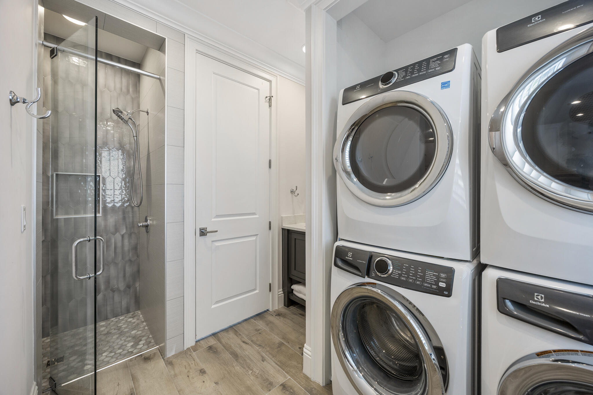 26 Azzurro Way, Unit A Santa Rosa Beach, FL 32459 - Photo 23 of 60 a view of a hallway with washer and dryer
