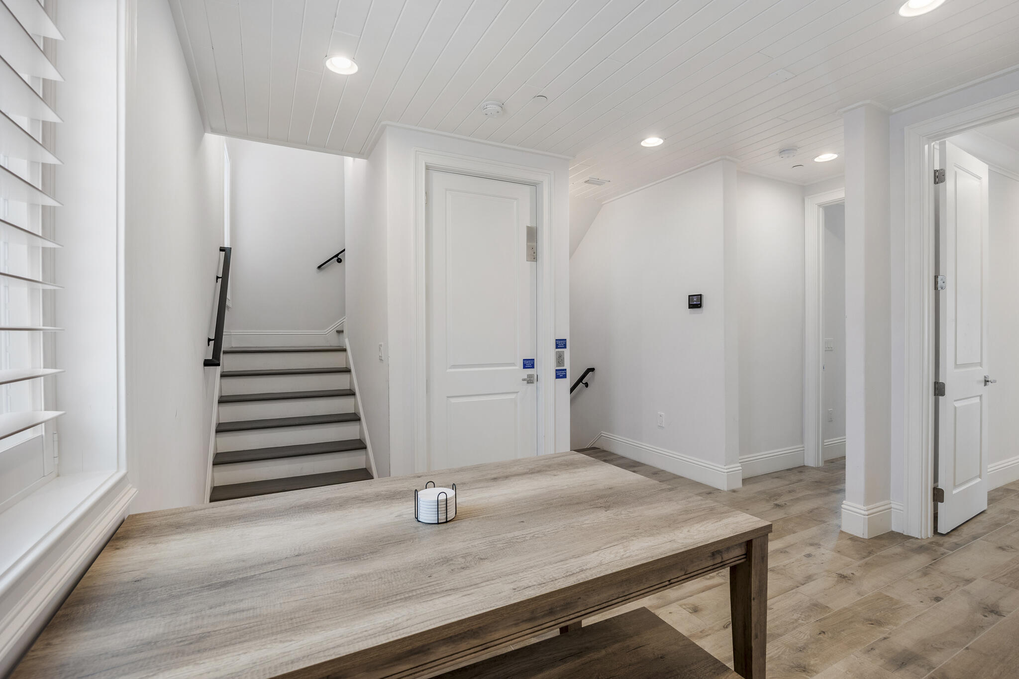 26 Azzurro Way, Unit A Santa Rosa Beach, FL 32459 - Photo 24 of 60 a view of a hallway with wooden floor and entryway