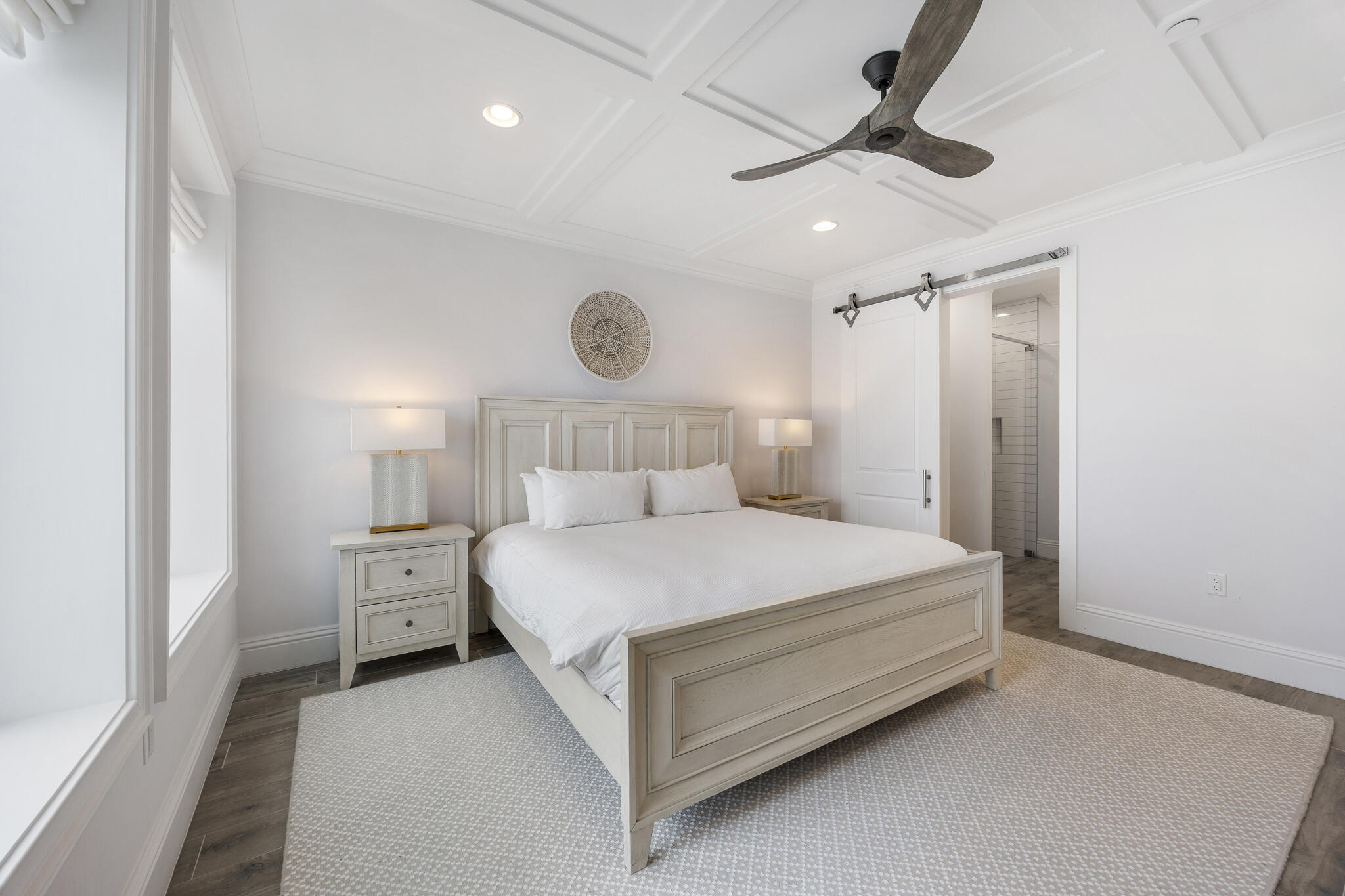 26 Azzurro Way, Unit A Santa Rosa Beach, FL 32459 - Photo 26 of 60 a bedroom with a bed and a ceiling fan