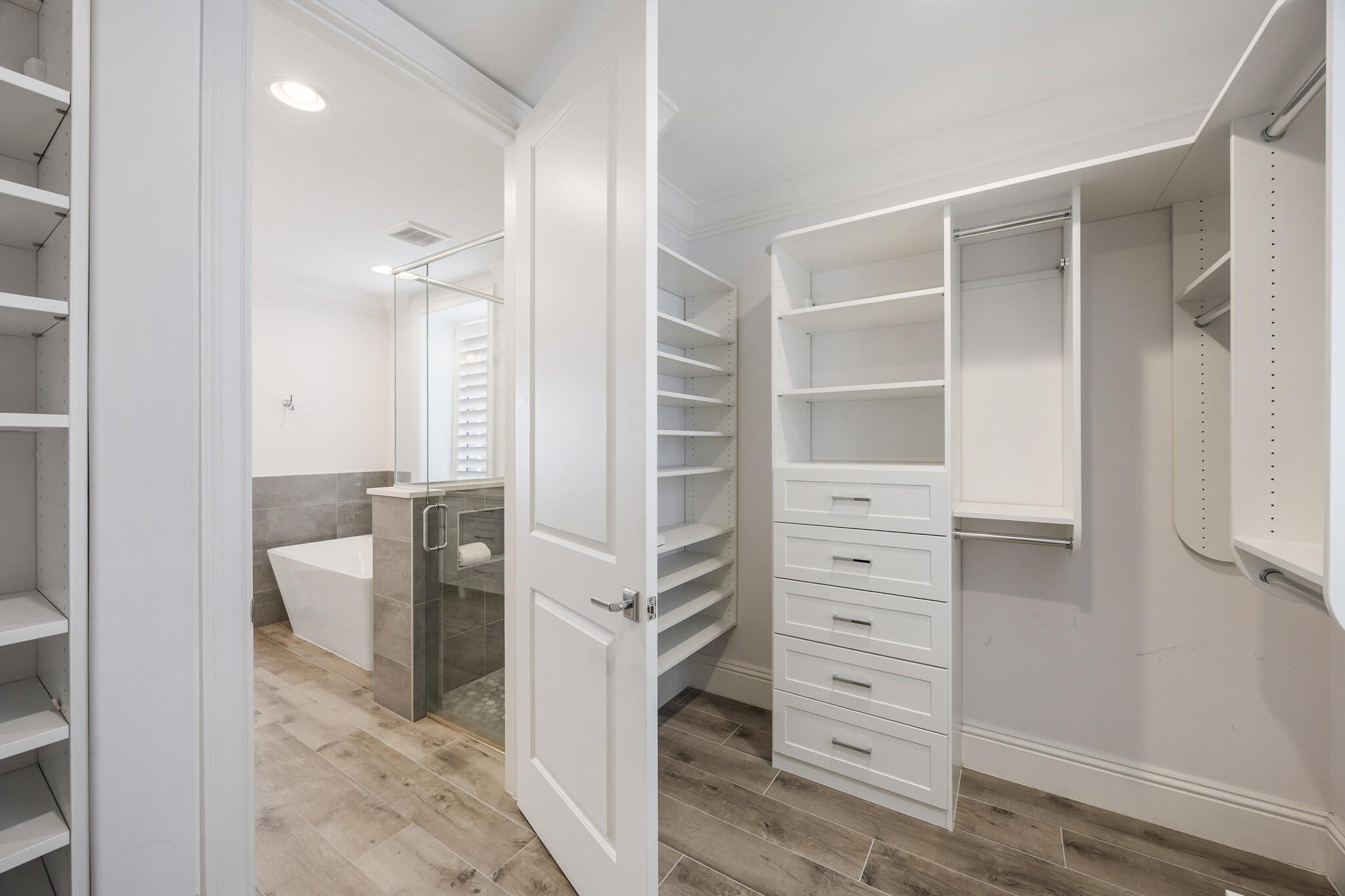 26 Azzurro Way, Unit A Santa Rosa Beach, FL 32459 - Photo 42 of 60 a view of walk in closet and bathroom