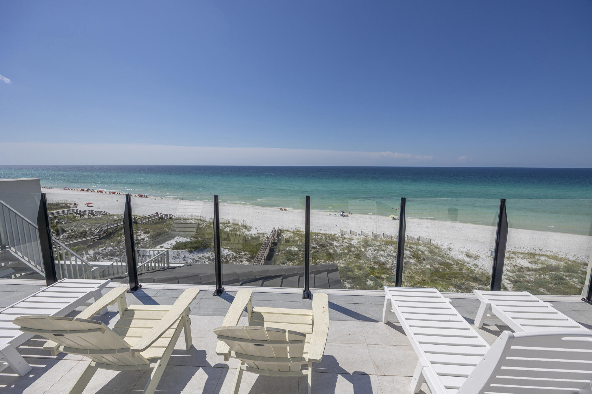 26 Azzurro Way, Unit A Santa Rosa Beach, FL 32459 - Photo 53 of 60 a living room with furniture and a floor to ceiling window