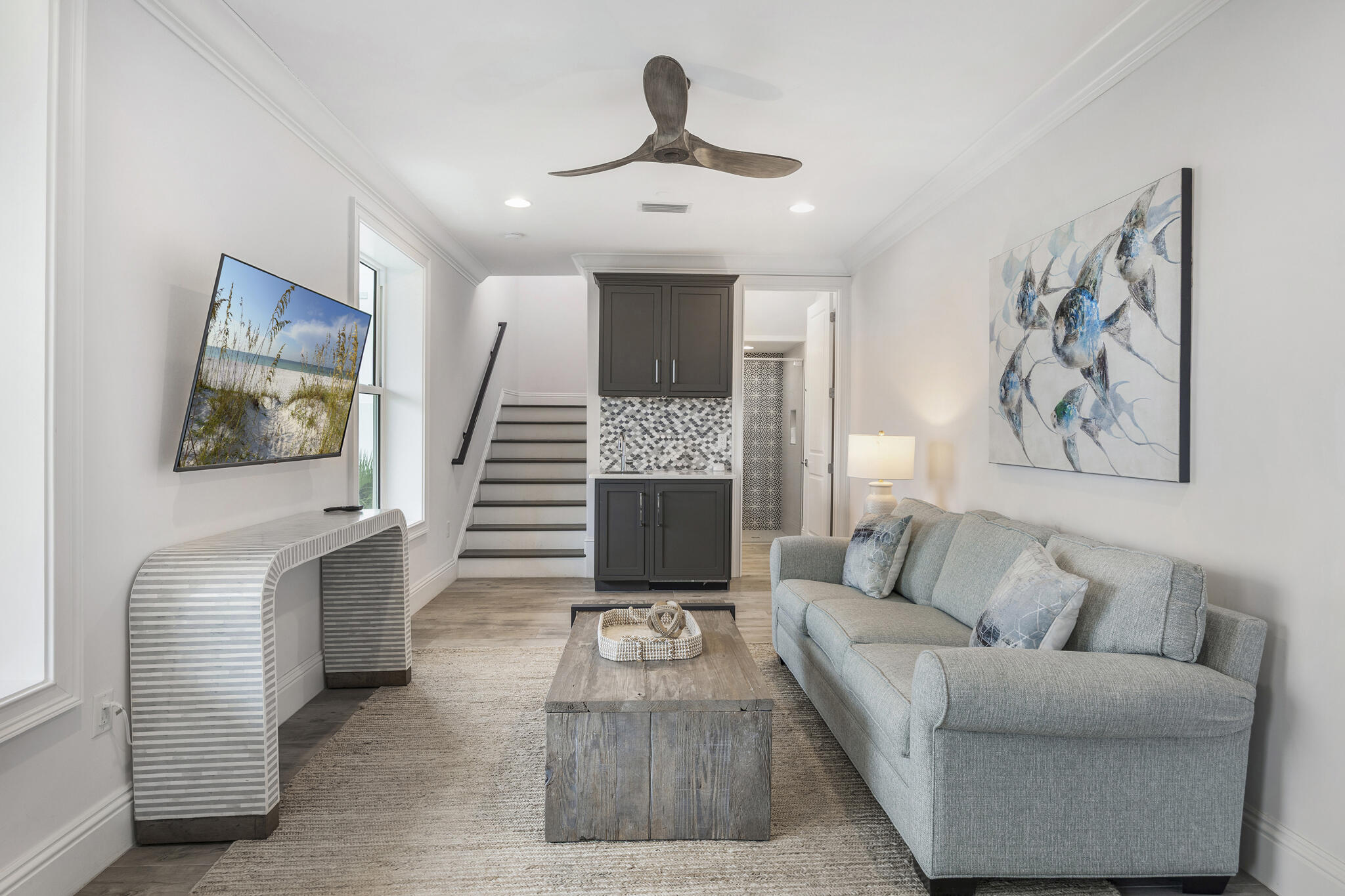 26 Azzurro Way, Unit A Santa Rosa Beach, FL 32459 - Photo 6 of 60 a living room with furniture and a fireplace