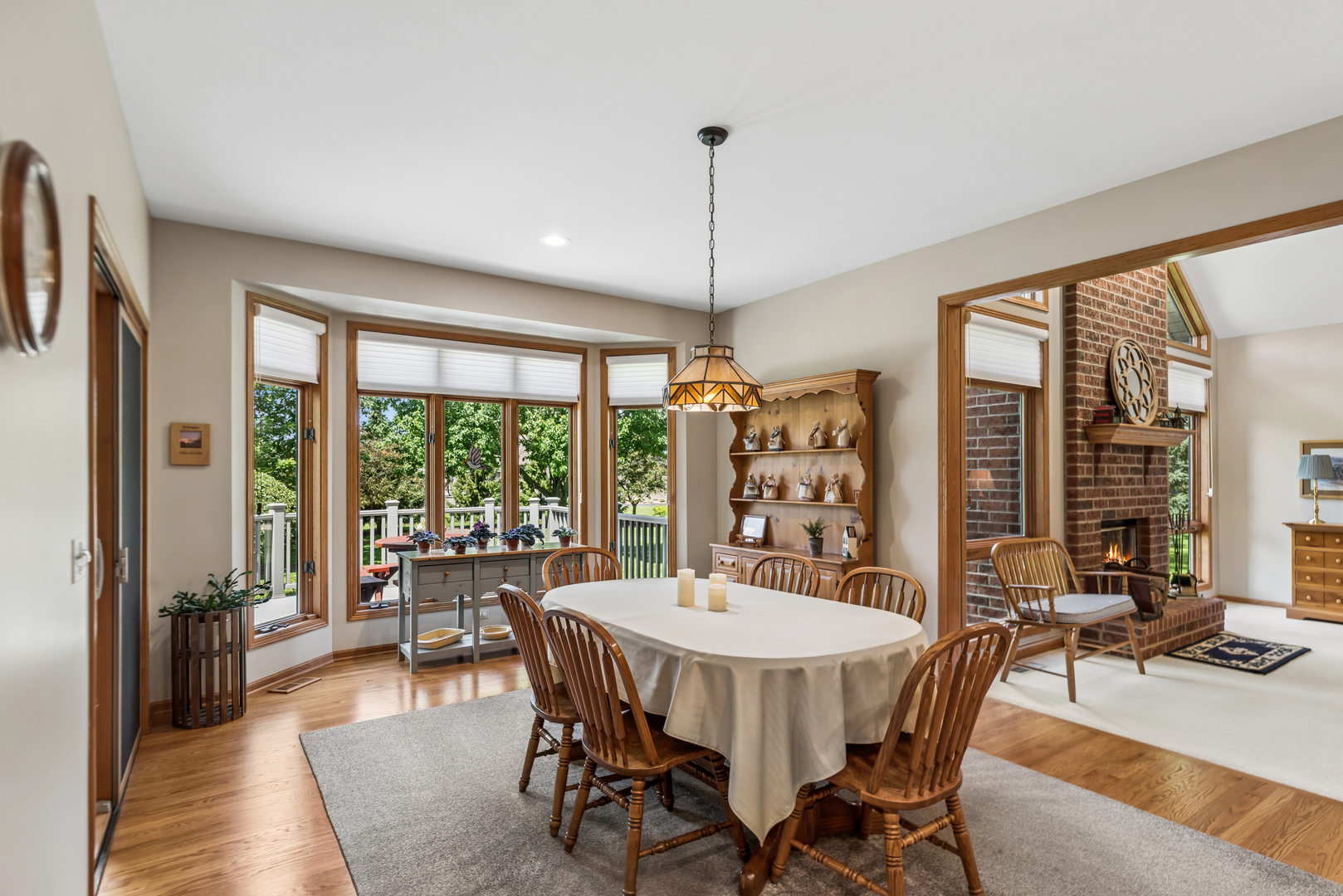 10907 Red Hawk Lane Spring Grove, IL 60071 - Photo 15 of 44 a view of a dining room with furniture window and outside view
