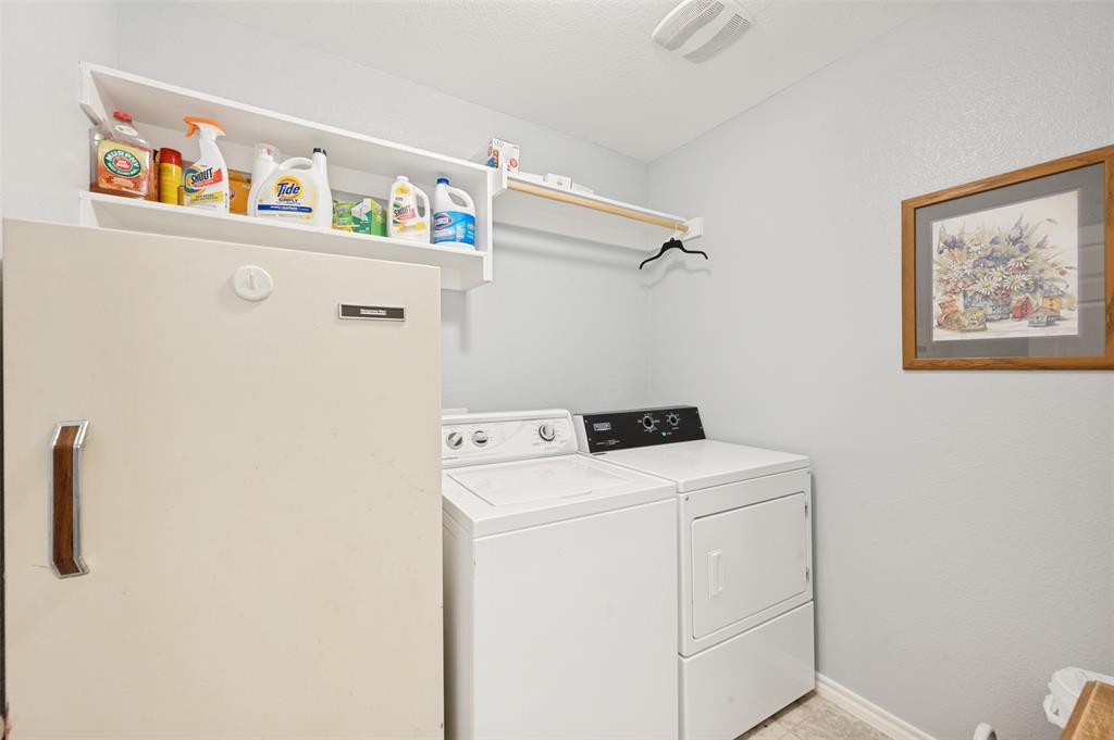 3905 Bridle Path Lane Sanger, TX 76266 - Photo 21 of 26 a utility room with dryer and washer