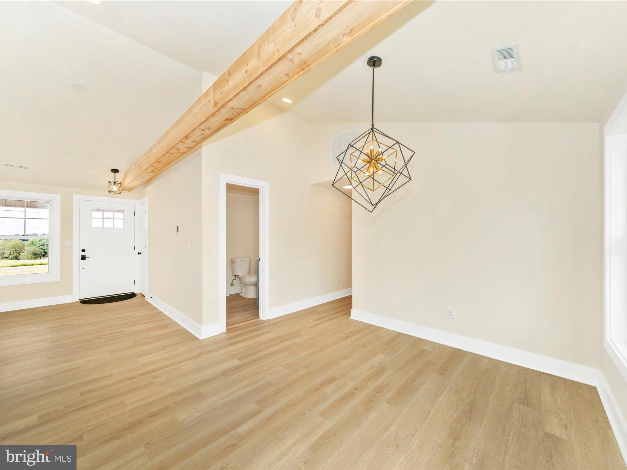 14901 New Windsor Road New Windsor, MD 21776 - Photo 16 of 75 a view of a hallway with wooden floor