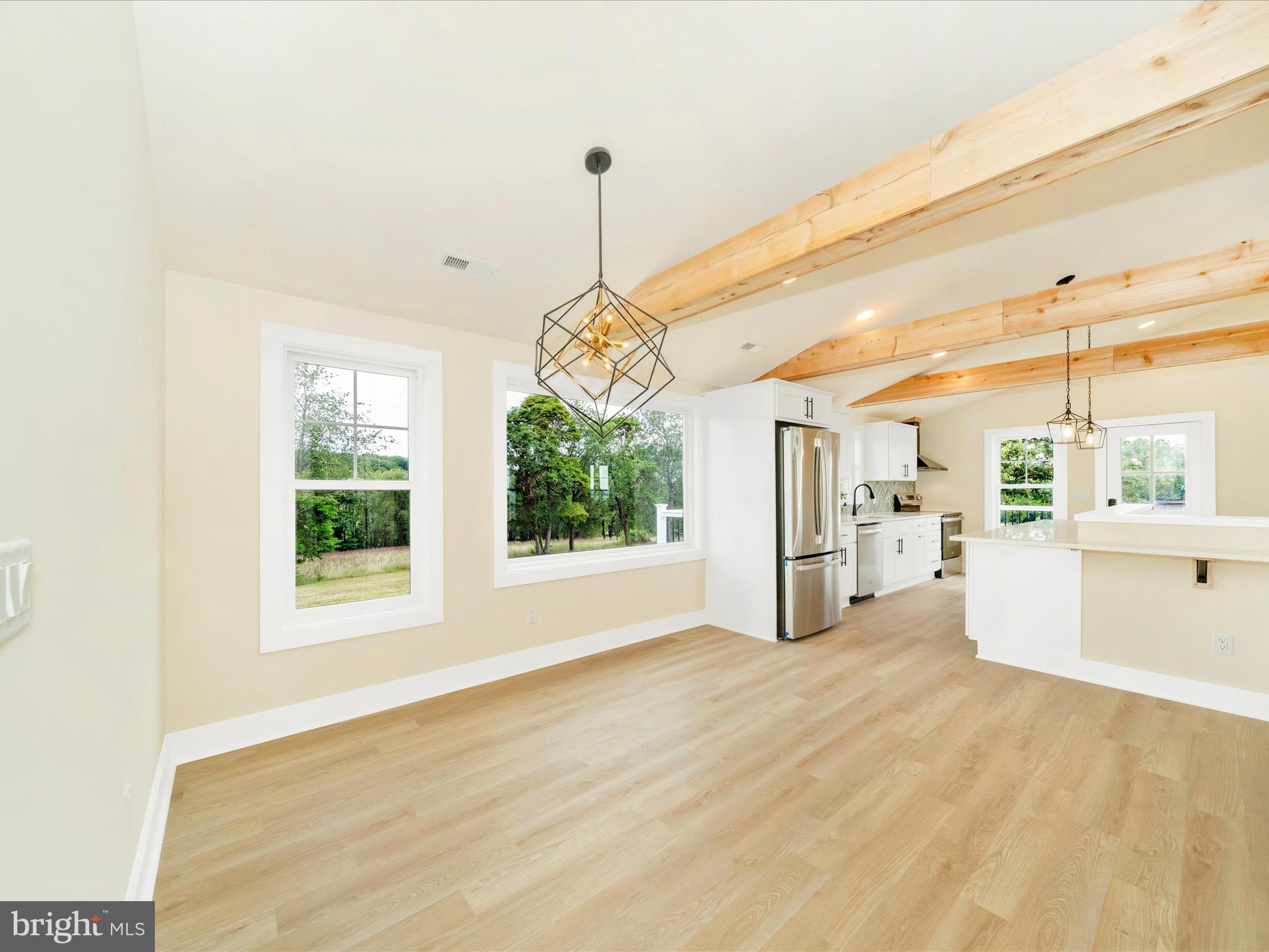 14901 New Windsor Road New Windsor, MD 21776 - Photo 18 of 75 a view of an empty room with a window