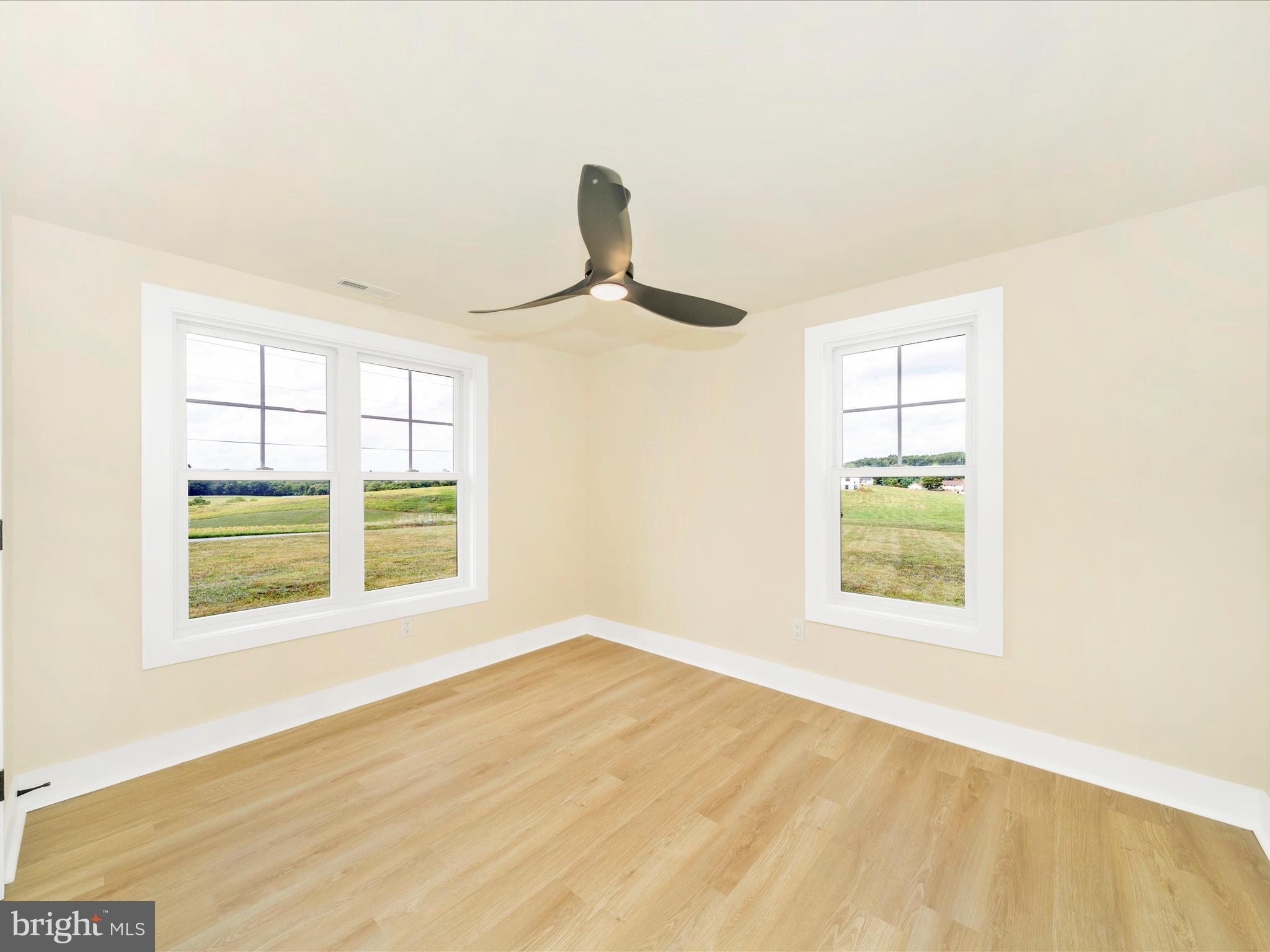 14901 New Windsor Road New Windsor, MD 21776 - Photo 24 of 75 a view of an empty room with a window