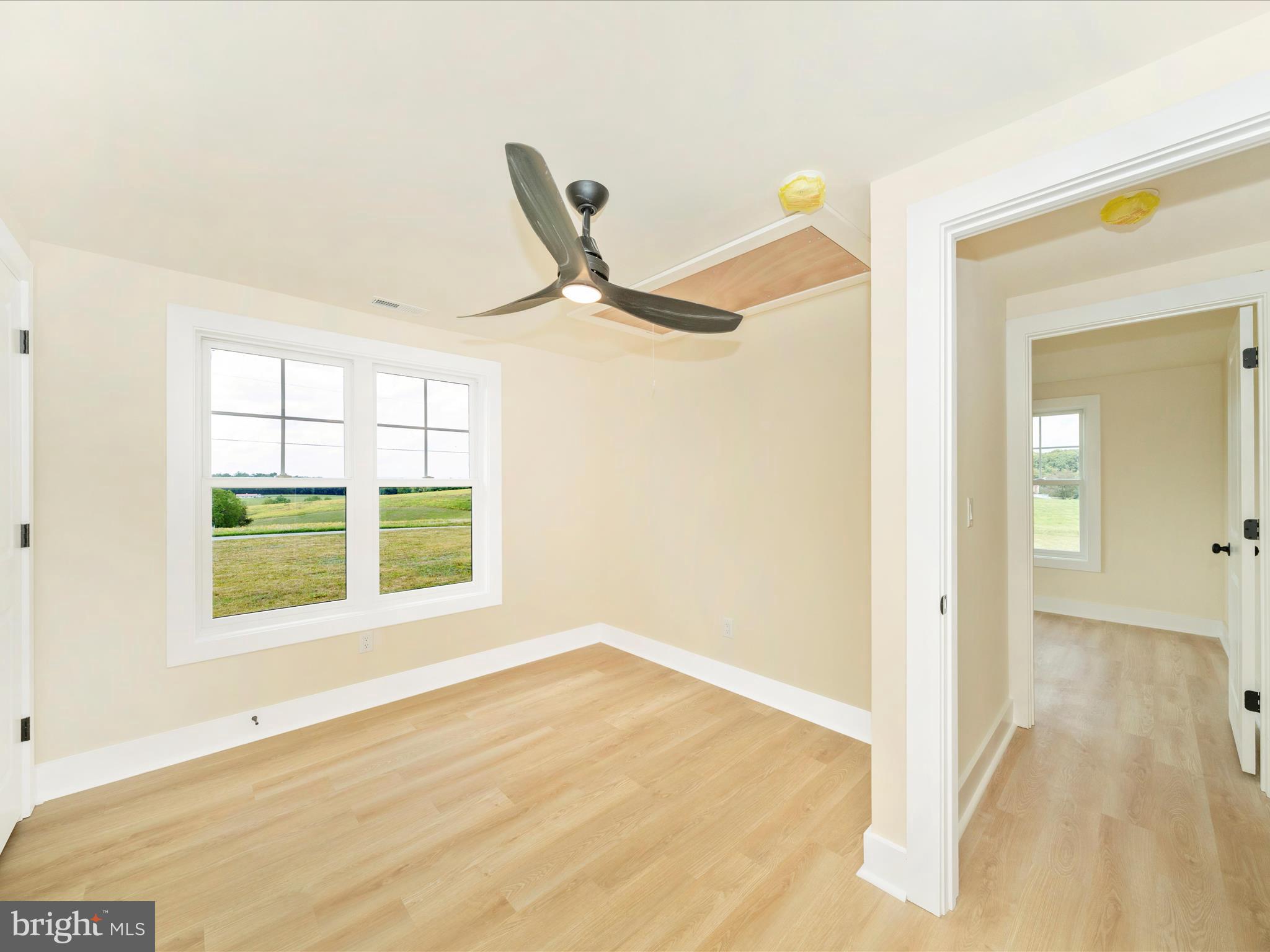 14901 New Windsor Road New Windsor, MD 21776 - Photo 27 of 75 a view of an empty room and window