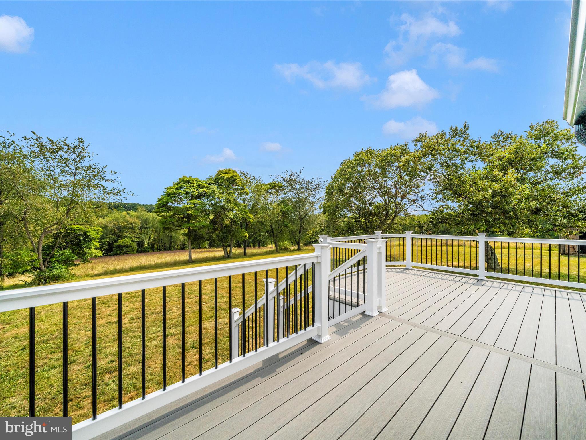 14901 New Windsor Road New Windsor, MD 21776 - Photo 45 of 75 a view of balcony with wooden floor and fence