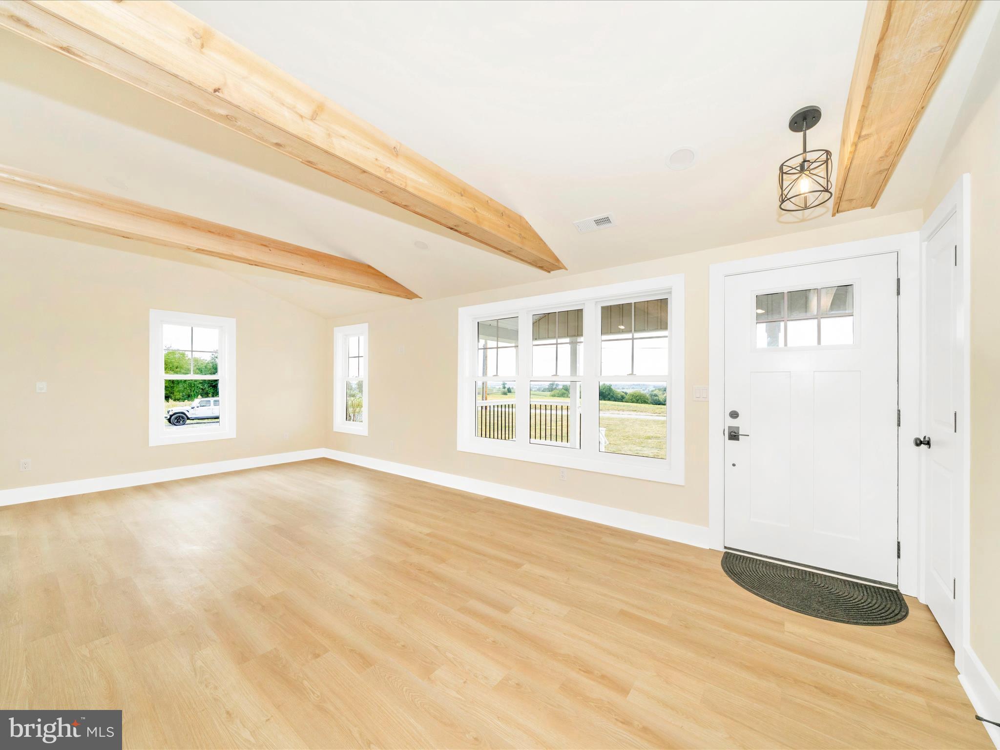 14901 New Windsor Road New Windsor, MD 21776 - Photo 5 of 75 a view of an empty room with a window