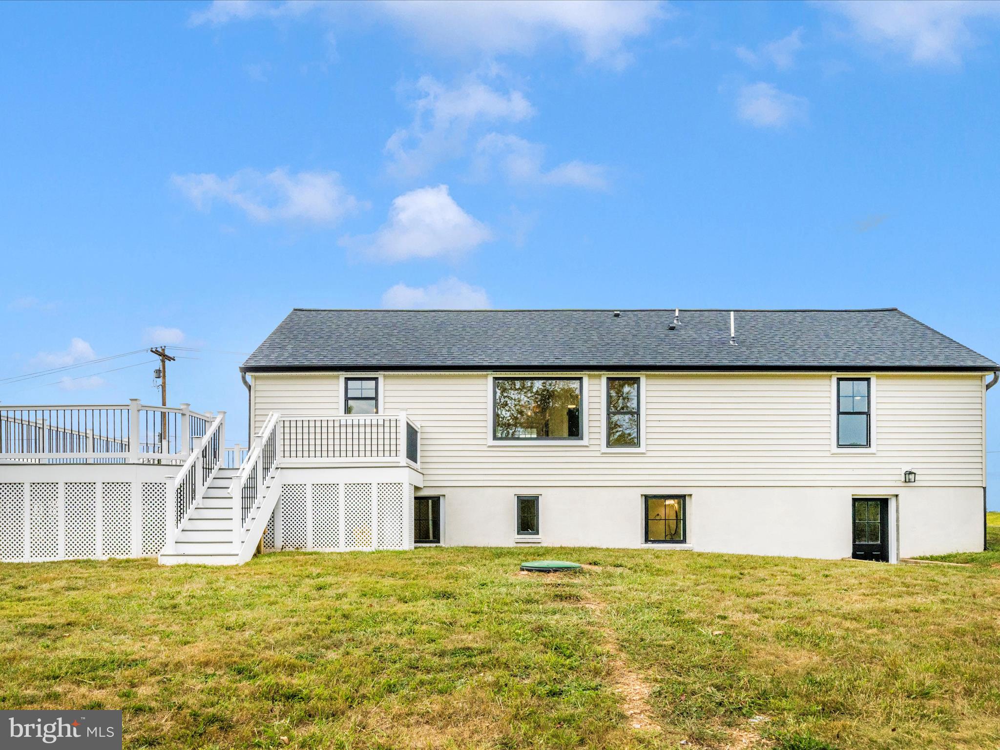 14901 New Windsor Road New Windsor, MD 21776 - Photo 51 of 75 a front view of a house with a yard