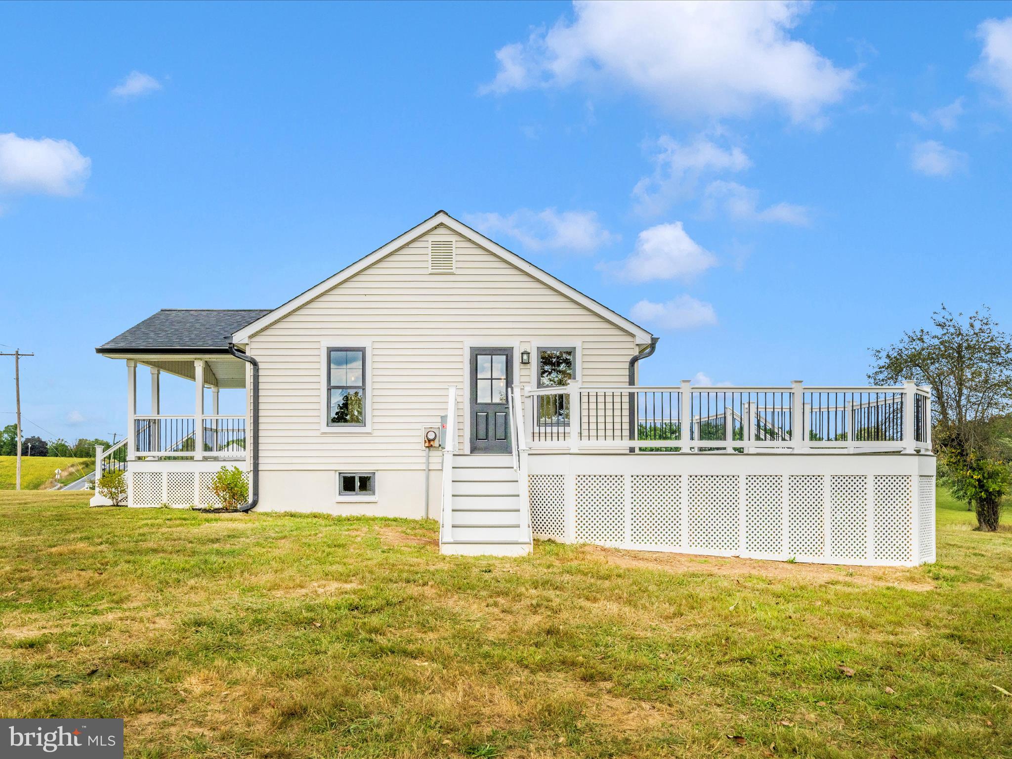 14901 New Windsor Road New Windsor, MD 21776 - Photo 52 of 75 a view of a house with a swimming pool