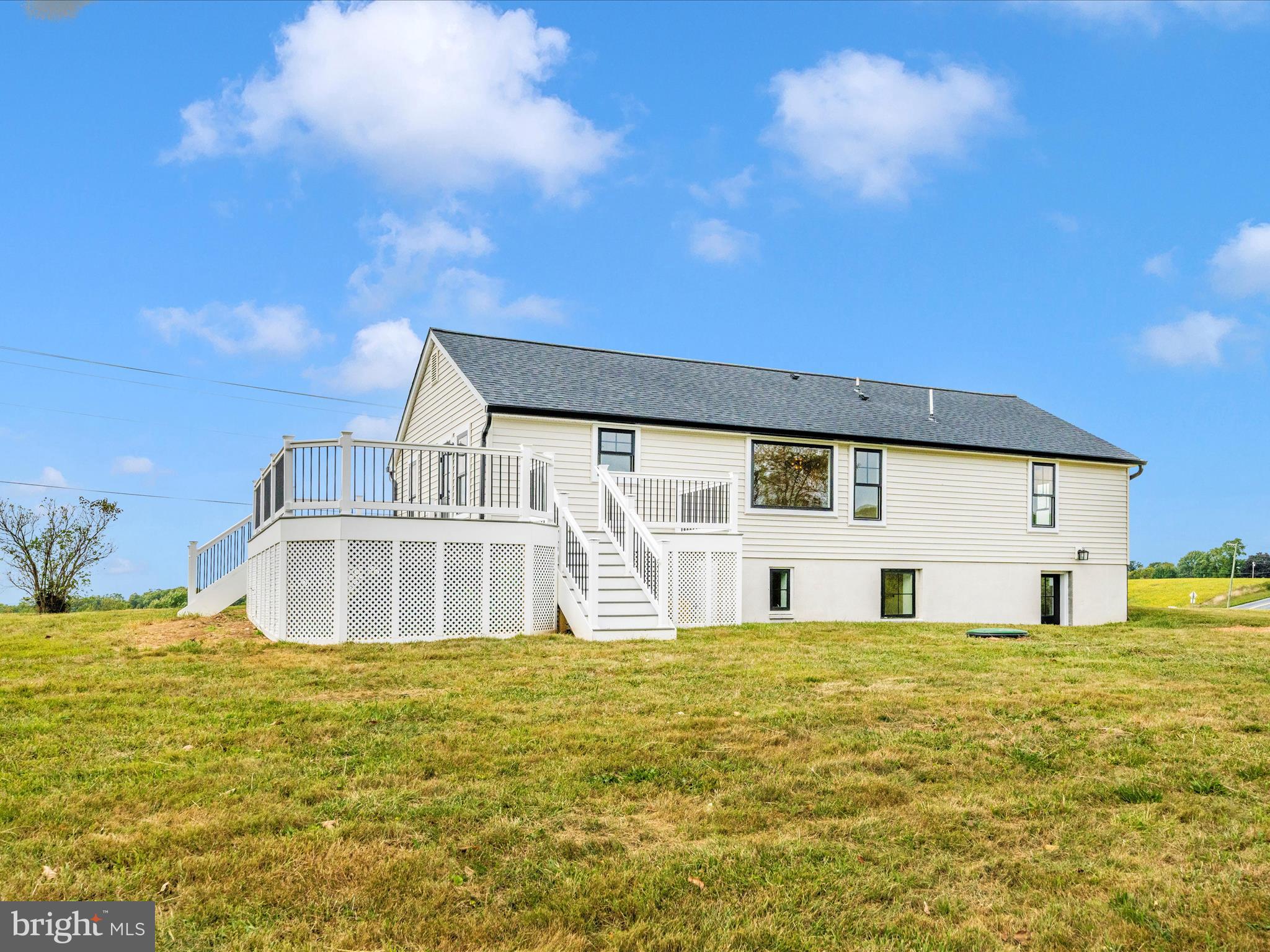 14901 New Windsor Road New Windsor, MD 21776 - Photo 53 of 75 a house view with swimming pool in front of it