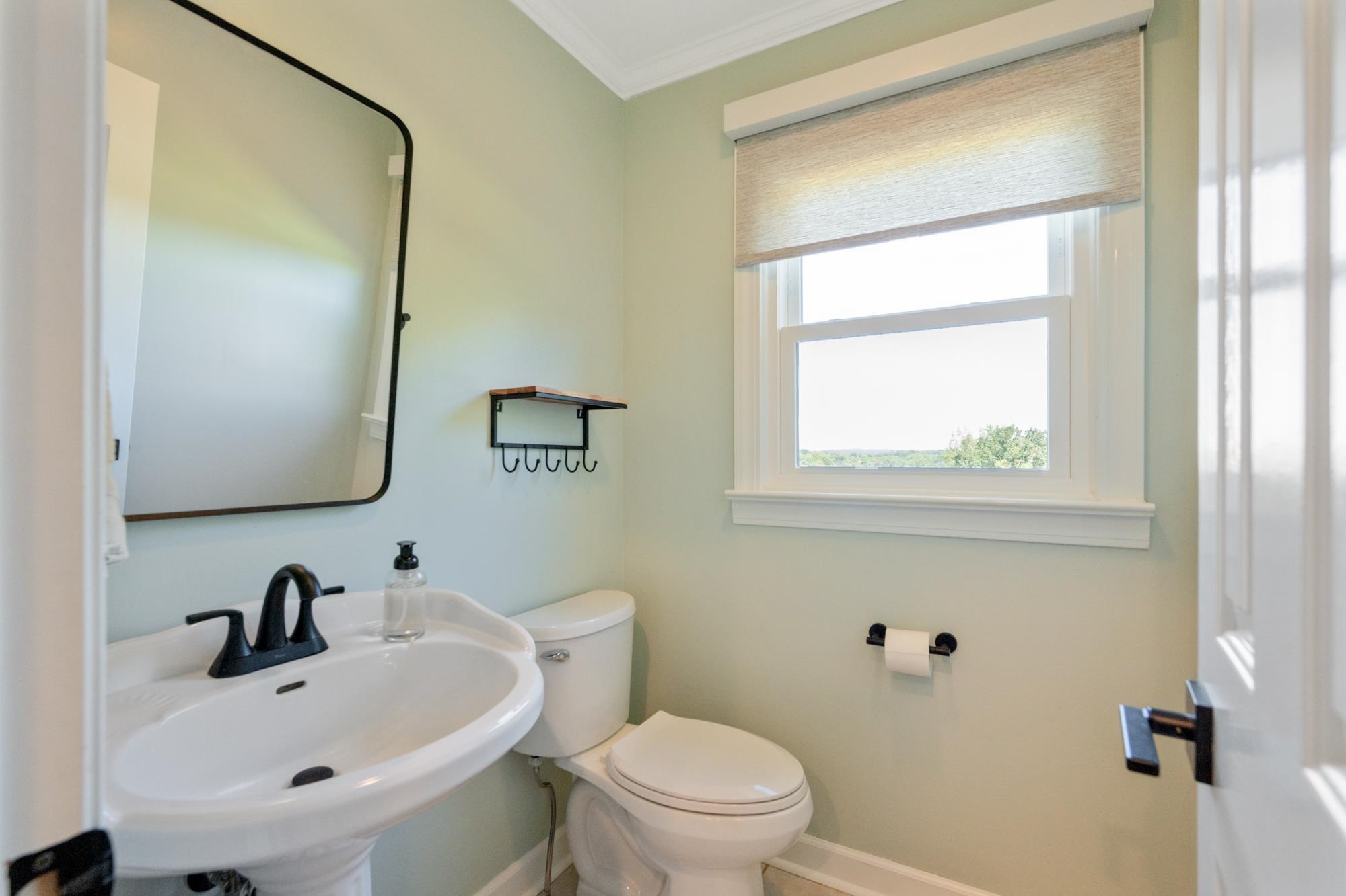 599 DT Vise Loop Parsons, TN 38363 - Photo 15 of 40 Bathroom with ornamental molding and toilet