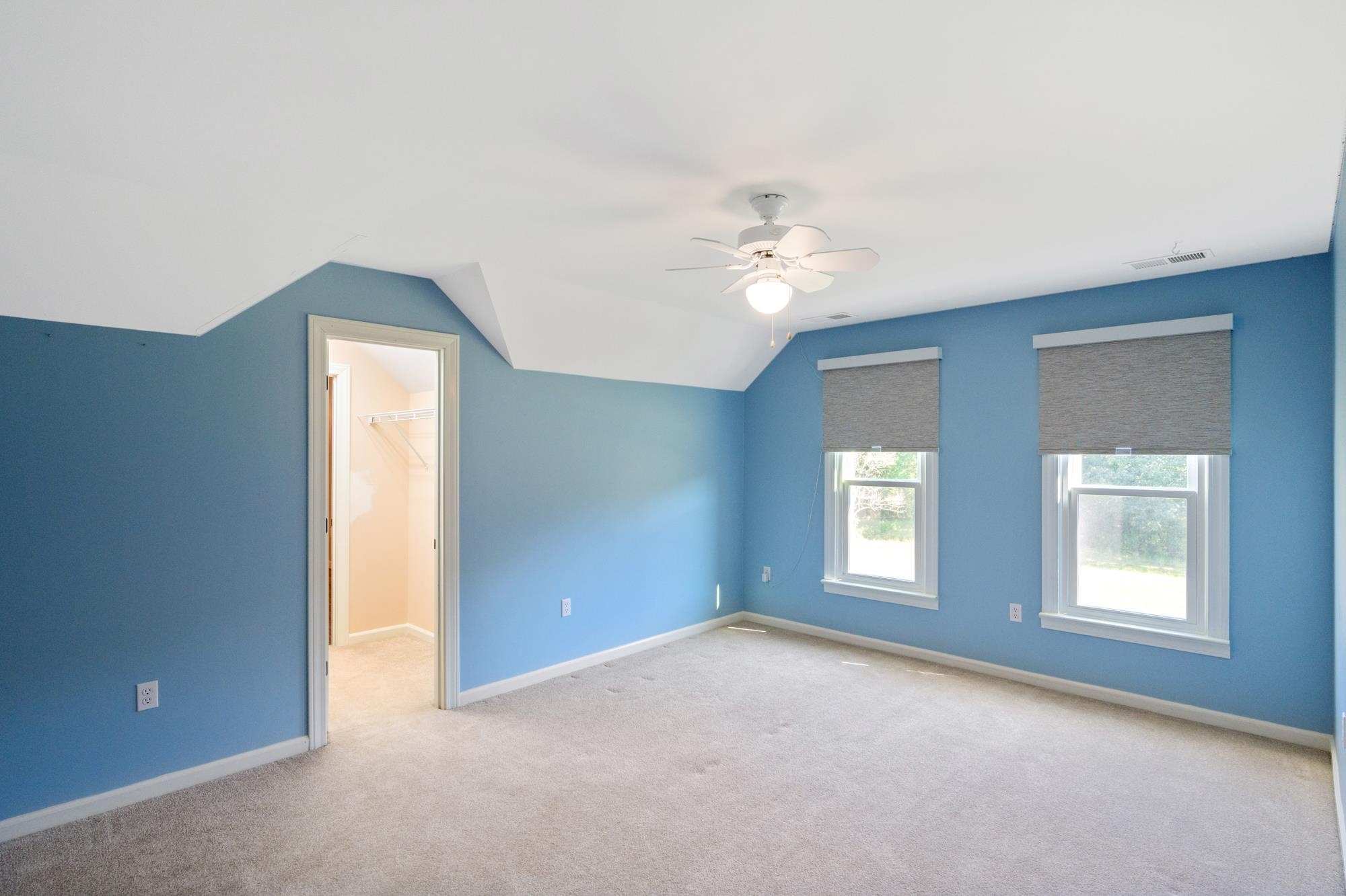 599 DT Vise Loop Parsons, TN 38363 - Photo 24 of 40 Bonus room with carpet floors, vaulted ceiling, and ceiling fan