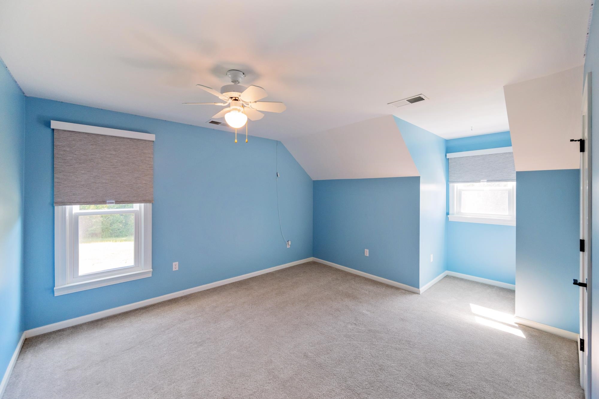 599 DT Vise Loop Parsons, TN 38363 - Photo 26 of 40 Bedroom featuring carpet floors, lofted ceiling, and ceiling fan