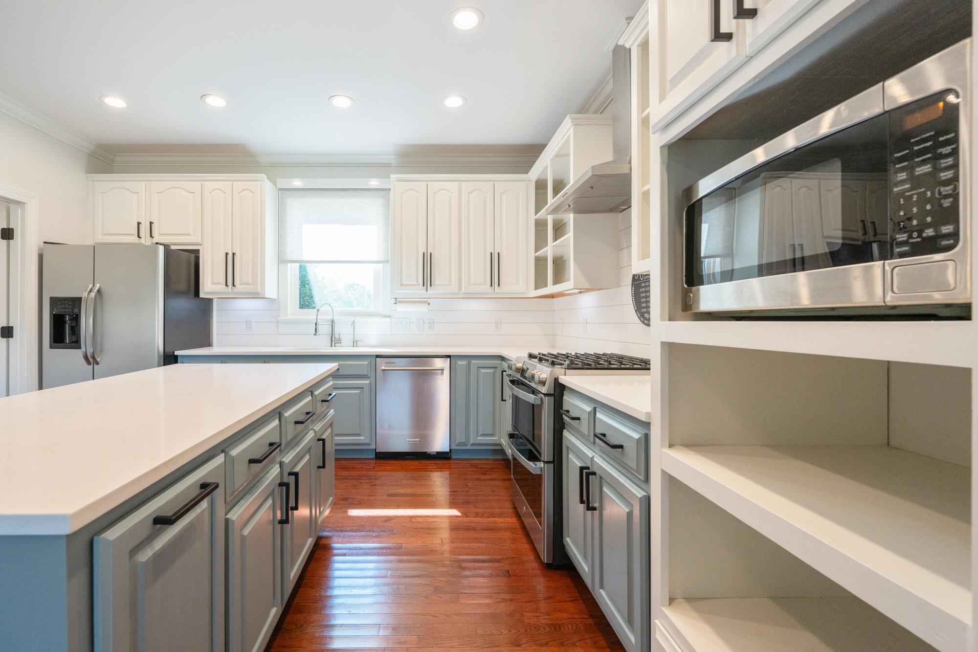 599 DT Vise Loop Parsons, TN 38363 - Photo 10 of 40 Kitchen with stainless steel appliances, open shelves, tasteful backsplash, recessed lighting, and dark wood-style flooring
