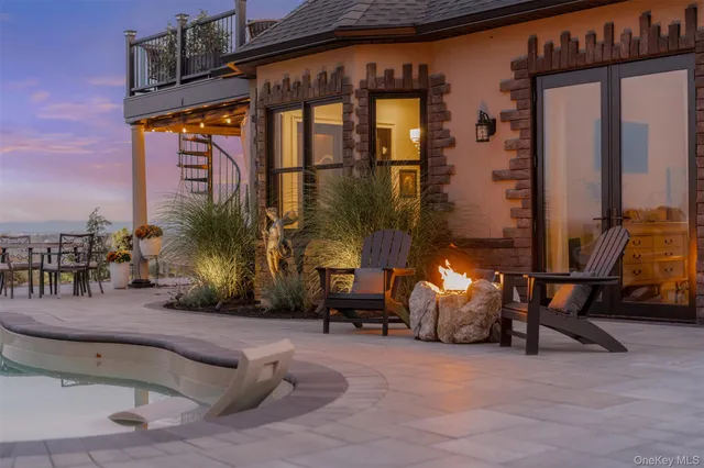 a view of building with sitting area