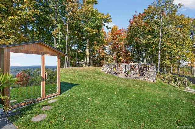a view of a chair and tables in the garden