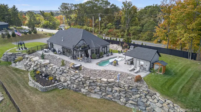 a view of a house with a yard