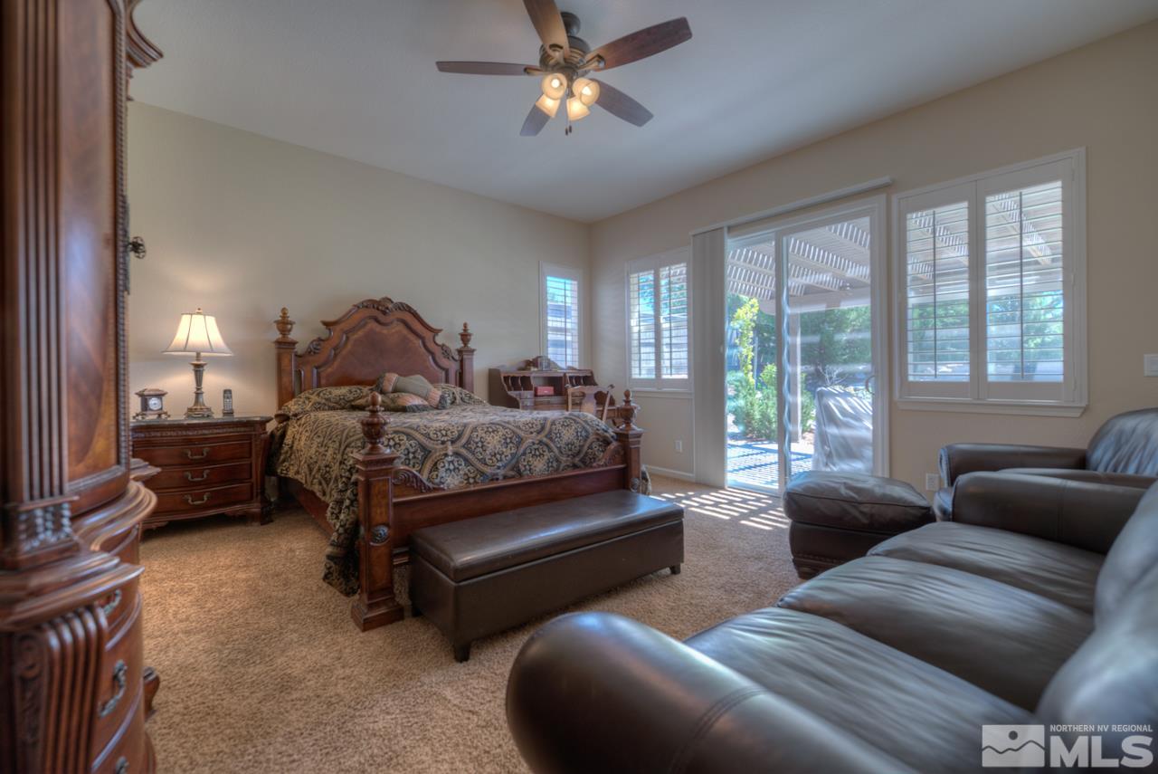 750 Sienna Station Way Reno, NV 89512 - Photo 13 of 21 a bedroom with furniture and a window