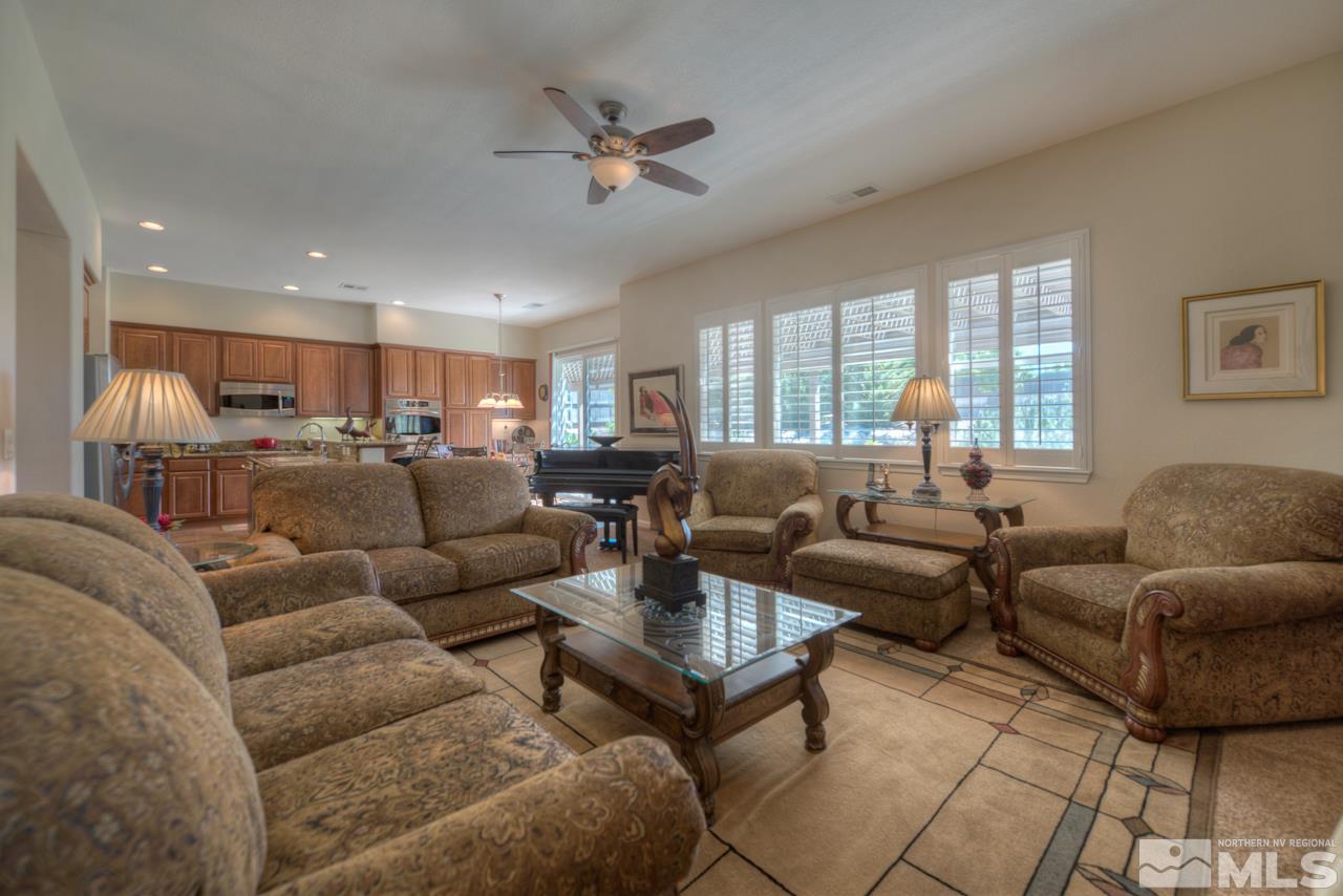 750 Sienna Station Way Reno, NV 89512 - Photo 6 of 21 a living room with furniture kitchen view and a large window