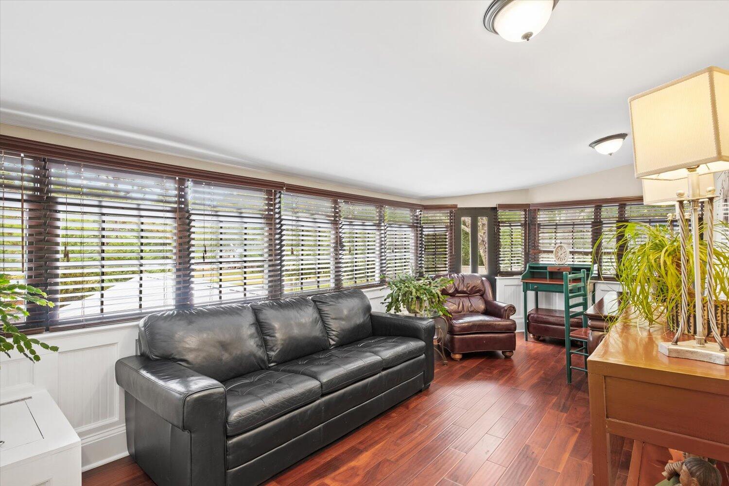54 Plateau Avenue DeFuniak Springs, FL 32435 - Photo 37 of 114 a living room with furniture and a large window